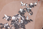 a piece of fabric with sequins on it