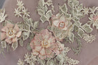 a close up of a dress with flowers on it