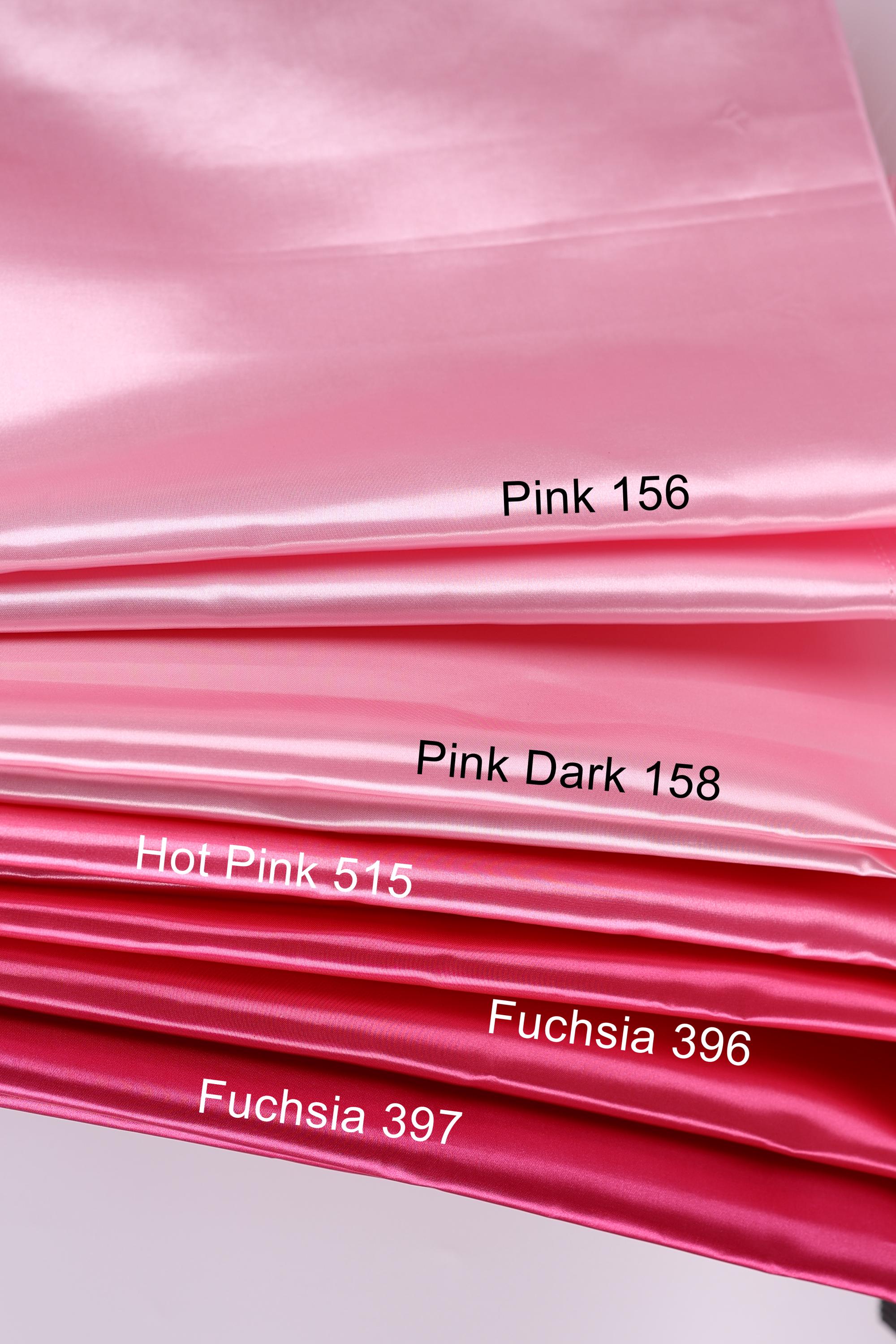 a collection of fabric swatches in various shades of pink, including Hot Pink, Pink Dark, and Fuchsia.