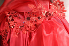 a close up of a dress on a mannequin