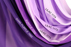 a close-up view of a fabric with various shades of purple, including dark purple, purple, and lavender. The fabric appears to be a sheer material, with the colors transitioning smoothly from one shade to another.