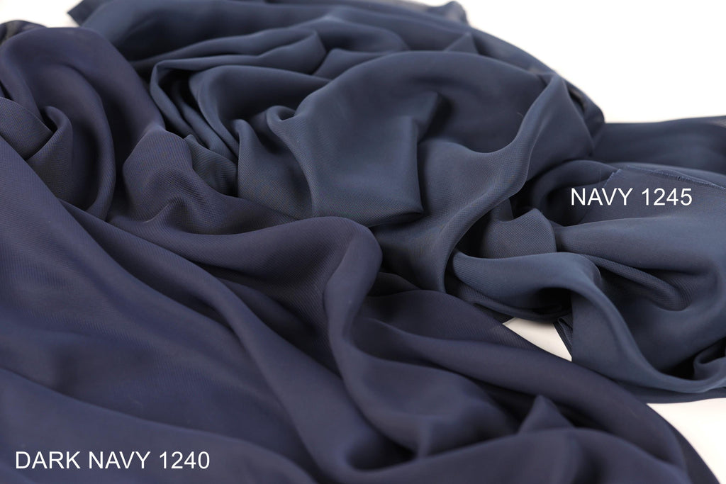 two different shades of navy blue fabric, with the darker shade labeled as "Dark Navy 1240" and the lighter shade labeled as "NAVY 1245".