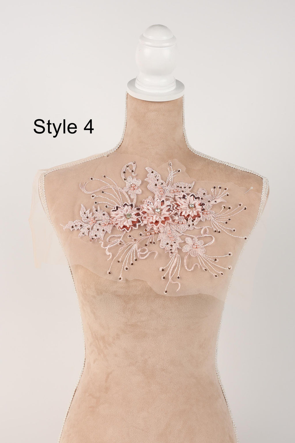 A mannequin with a decorative floral embroidery on its bust area, labeled as "Style 4".