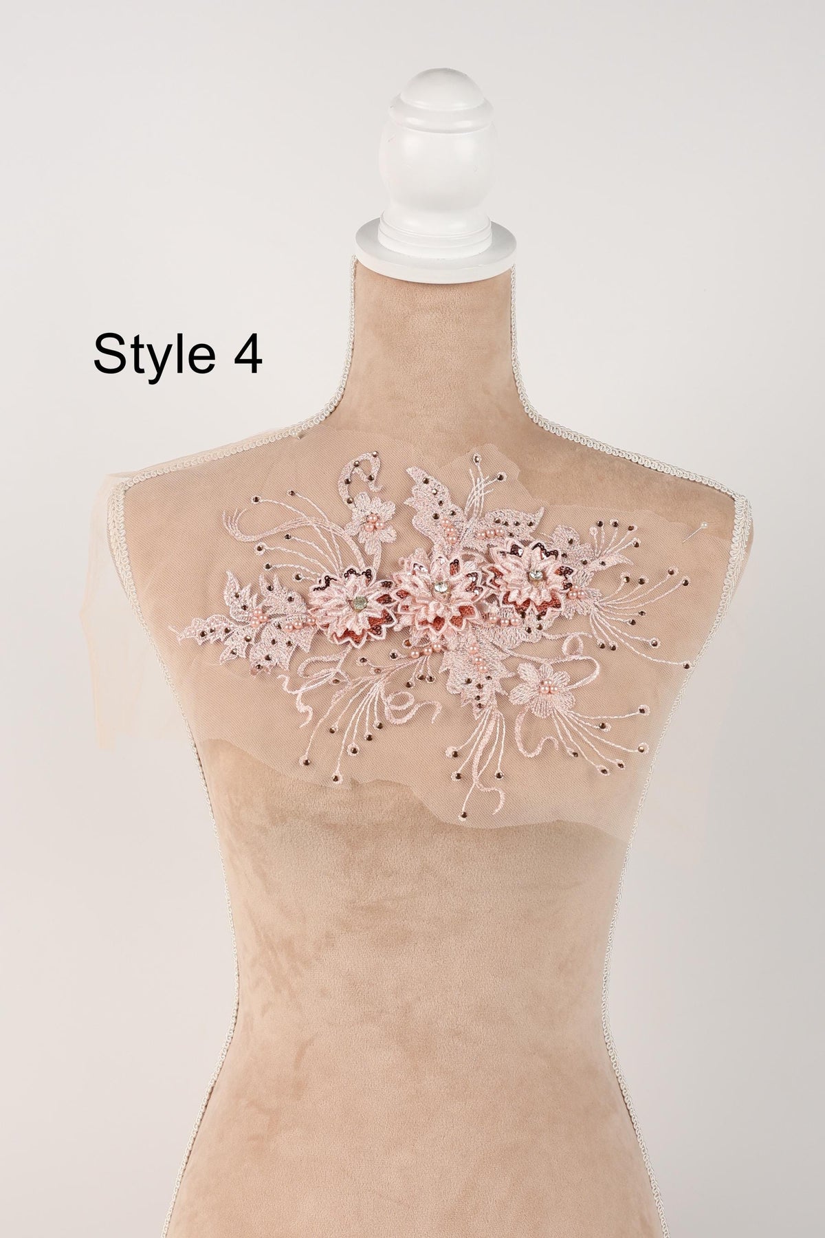 A mannequin with a decorative floral embroidery on its bust area, labeled as "Style 4".