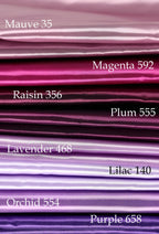 a collection of fabric swatches in various shades of purple, ranging from lavender to plum, with the names of the fabrics labeled below each swatch.