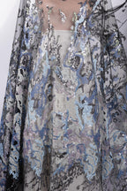 a close-up view of a fabric with a floral pattern, showcasing intricate details and textures.