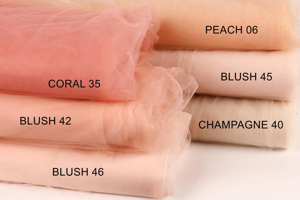 a collection of fabric swatches in various shades of peach, including coral, coral 35, coral 42, champagne 40, and champagne 46.