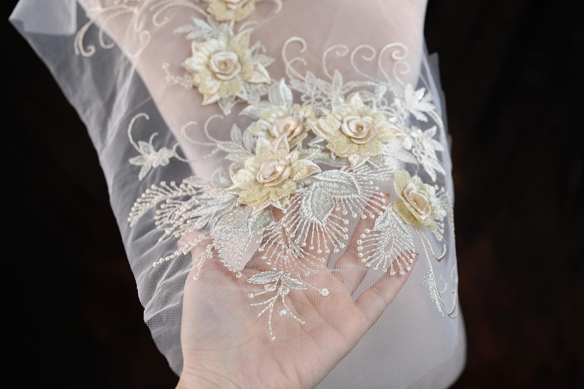 a close up of a person wearing a veil with flowers on it