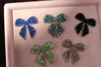a close up of a box with a bunch of bows on it