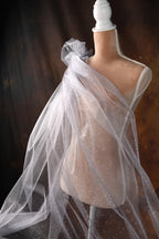 a mannequin with a veil on it's head