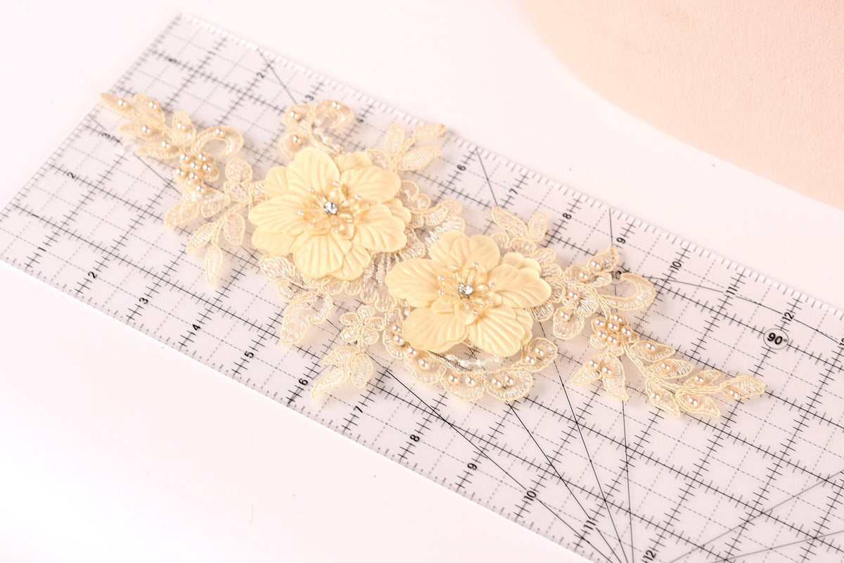 a clear ruler with a decorative floral design on it.