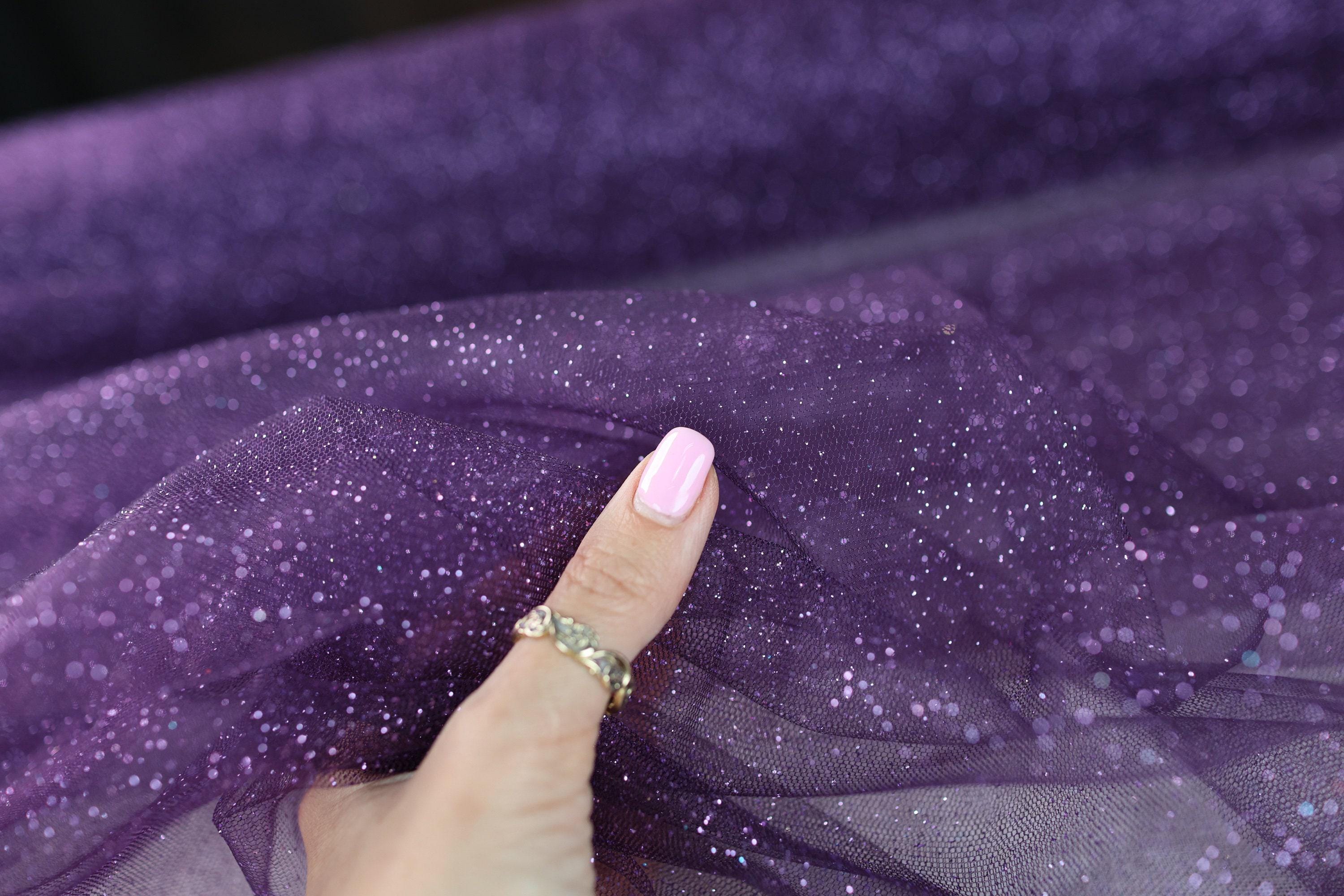 a woman's hand with a ring on her finger