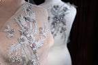 a close up of a dress on a mannequin