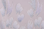 a pattern of white and silver glittering leaves or flowers against a light purple background.