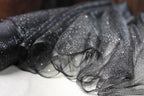 a close up of a piece of cloth on a table