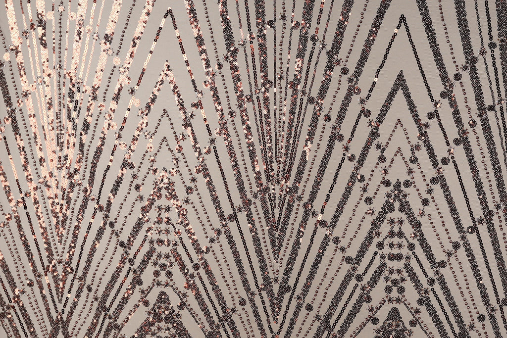 a close-up view of a textured surface with a repeating pattern of diagonal lines and small dots in shades of brown and black.