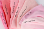 a collection of pink fabric swatches, each with a different shade and label indicating the color name.