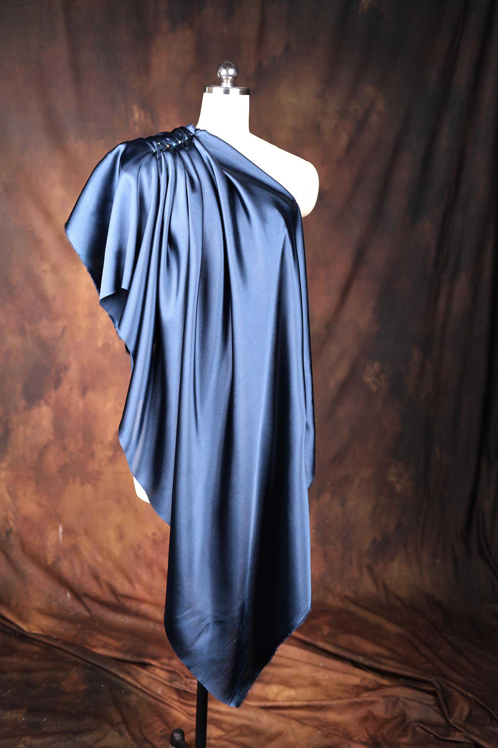 a dress on a mannequin on a brown background