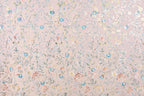 The image is a collage of various floral patterns and designs, including flowers, leaves, and branches in different colors and shapes. The patterns are scattered across the image, creating a visually rich and diverse composition.