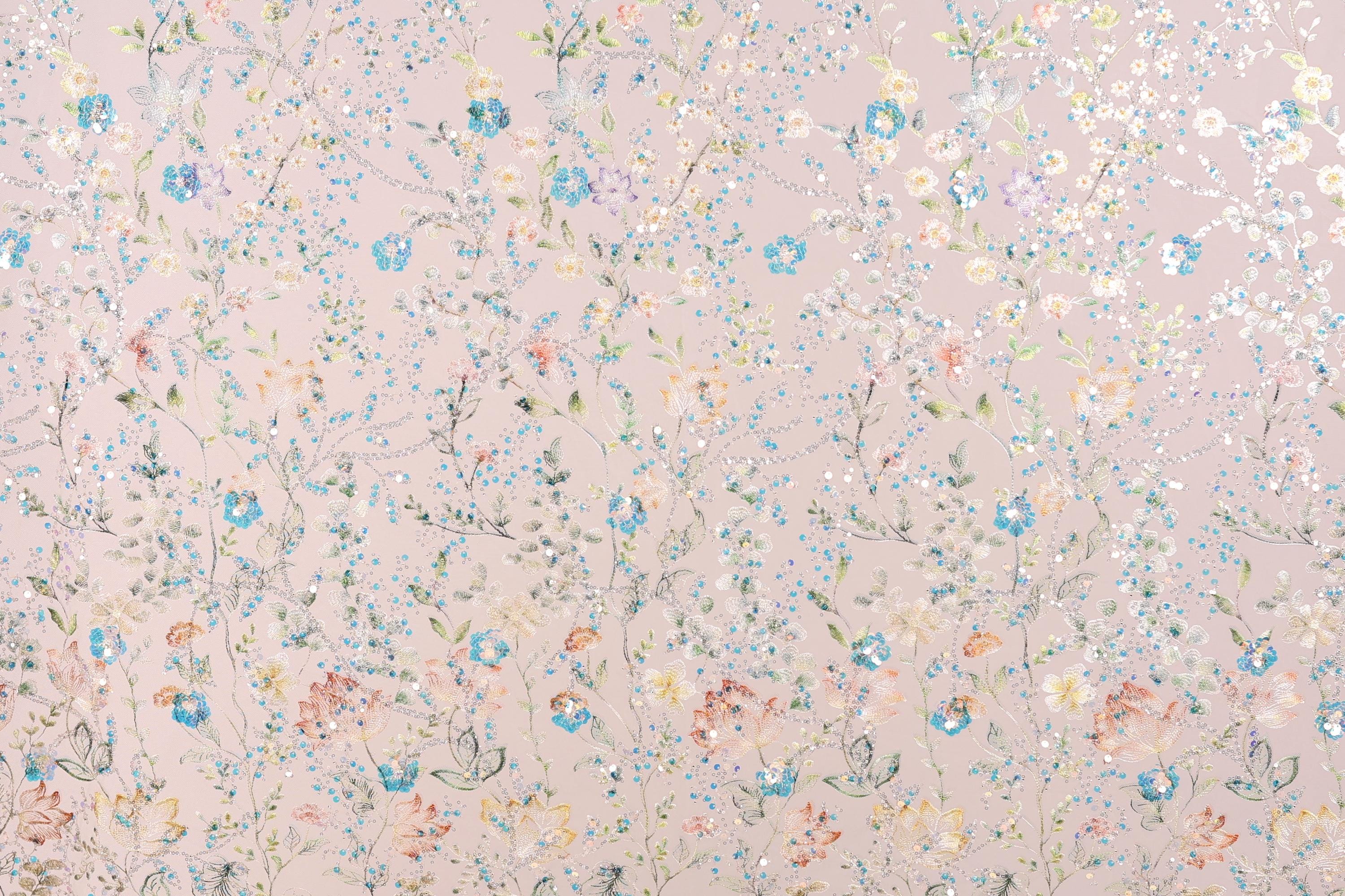 The image is a collage of various floral patterns and designs, including flowers, leaves, and branches in different colors and shapes. The patterns are scattered across the image, creating a visually rich and diverse composition.