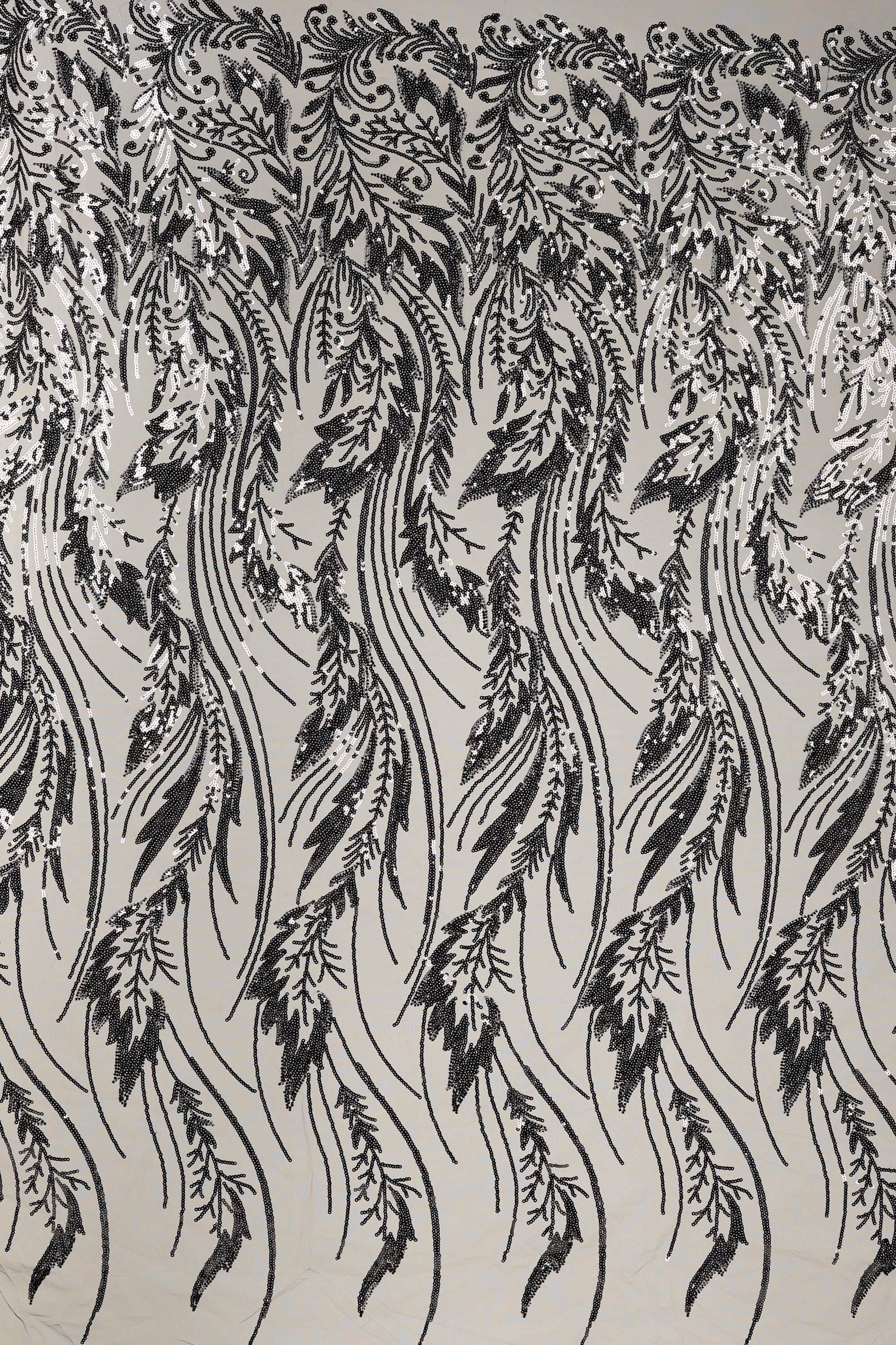 a repeating pattern of black and white feathers or leaves, creating a visually striking and intricate design.