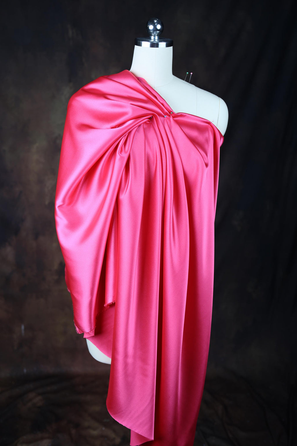 a mannequin with a pink dress on it