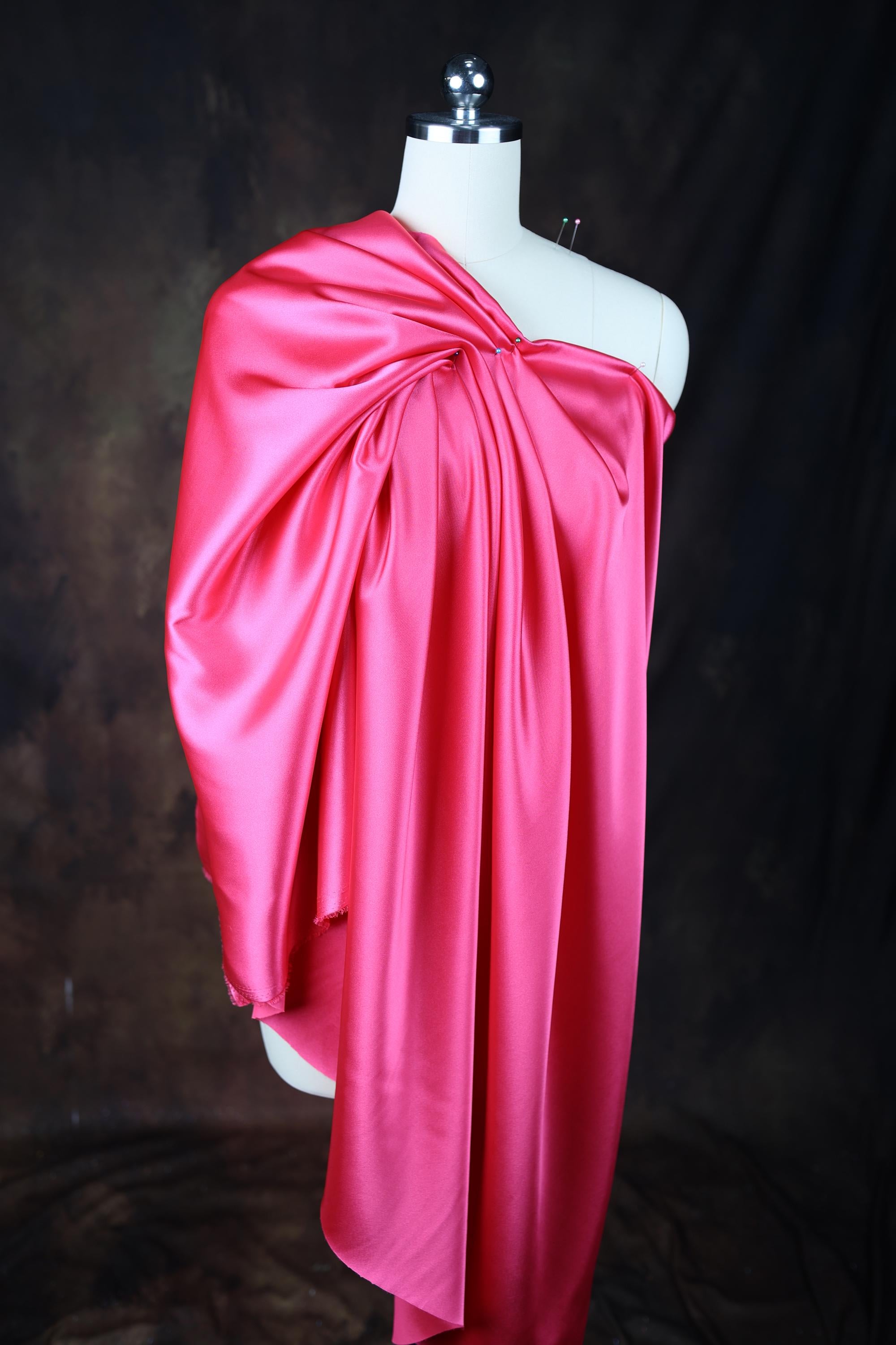 a mannequin with a pink dress on it