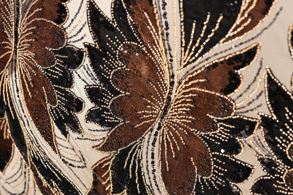 a close-up view of a fabric with a floral pattern, showcasing intricate details and textures.