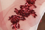 a close up of a piece of cloth with sequins on it