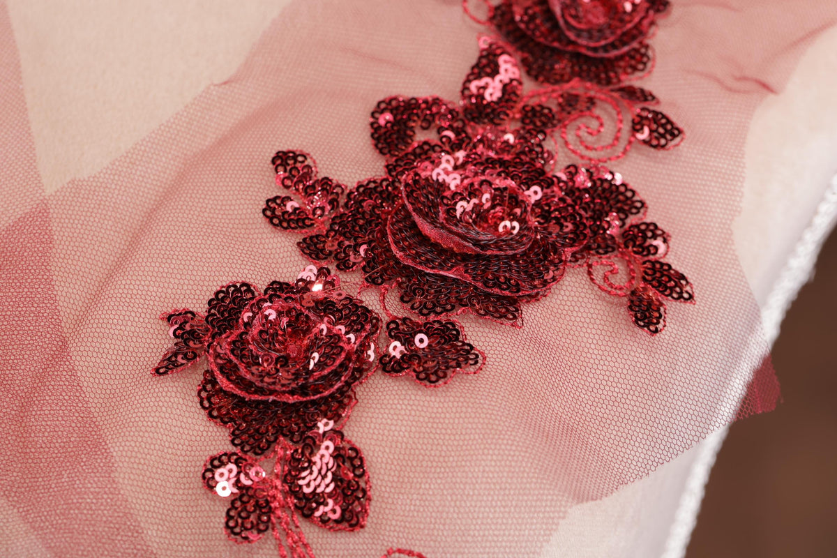 a close up of a piece of cloth with sequins on it