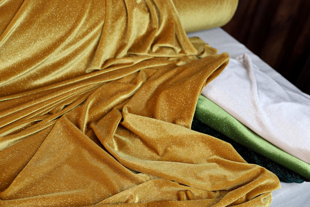 a close up of a blanket on a bed