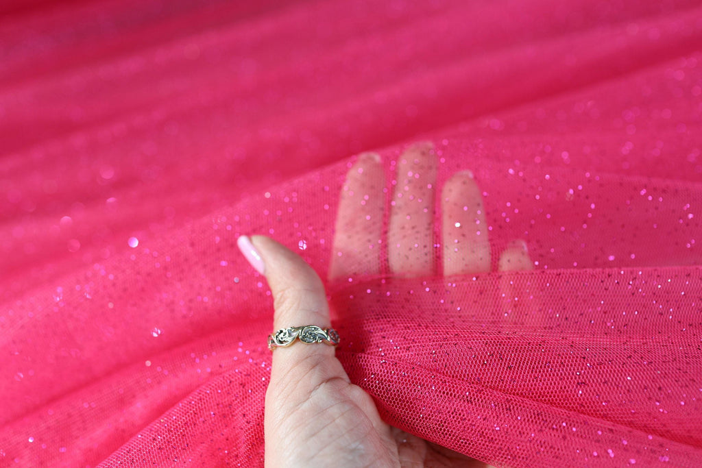 a woman's hand with a ring on her finger