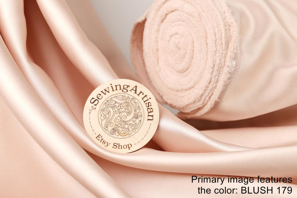 a pink fabric with a circular logo that says "Sewing Artist" and "Etsy Shop", along with the text "BLUSH 179".