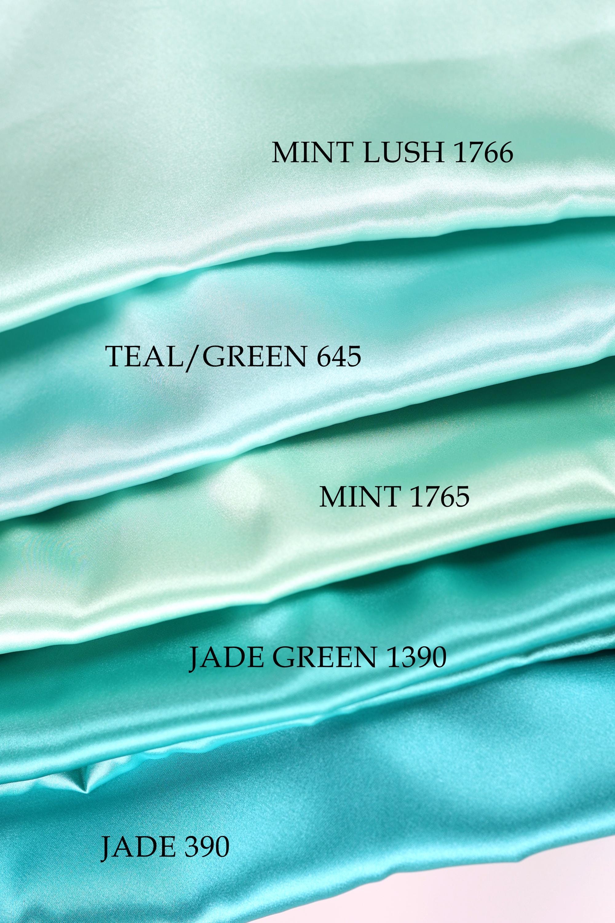 a collection of turquoise fabric swatches, each with a different shade and label indicating the color and name of the fabric.