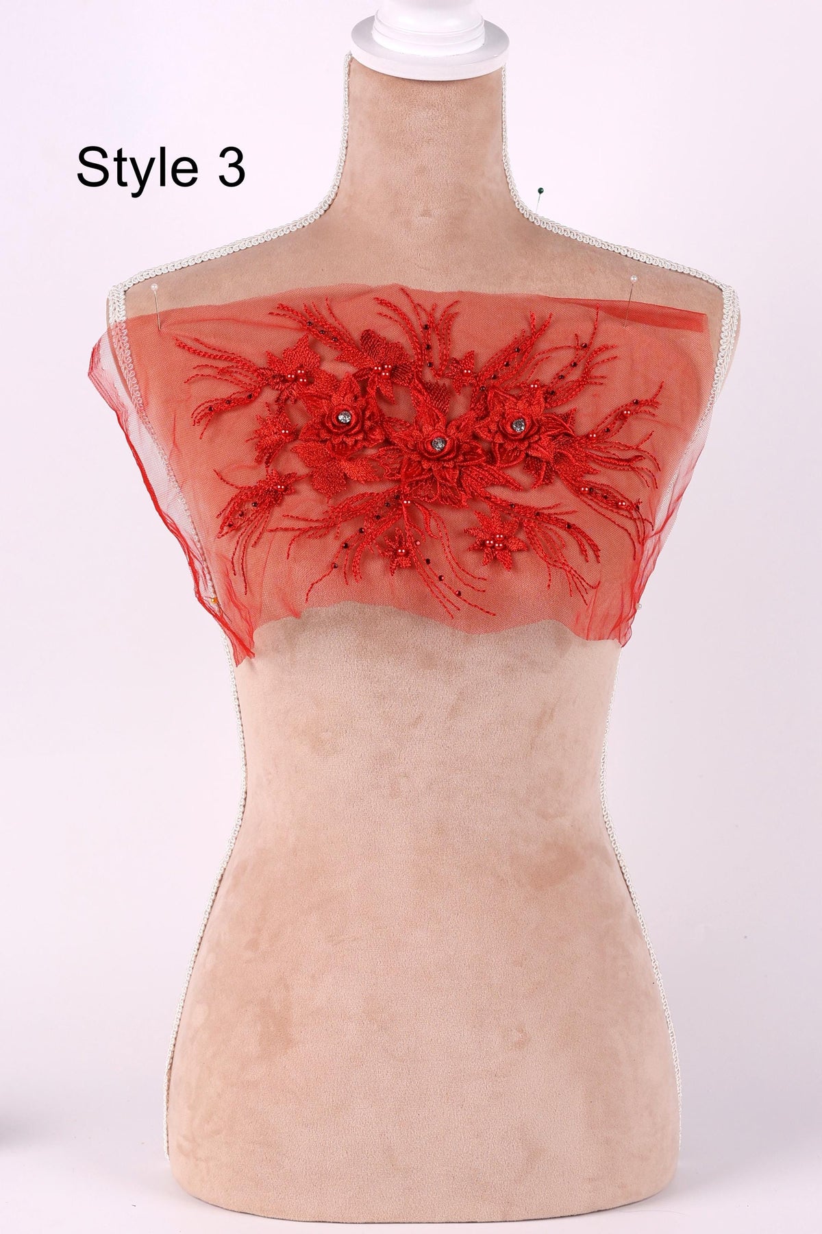 A mannequin with a red floral embroidered top, labeled as "Style 3".