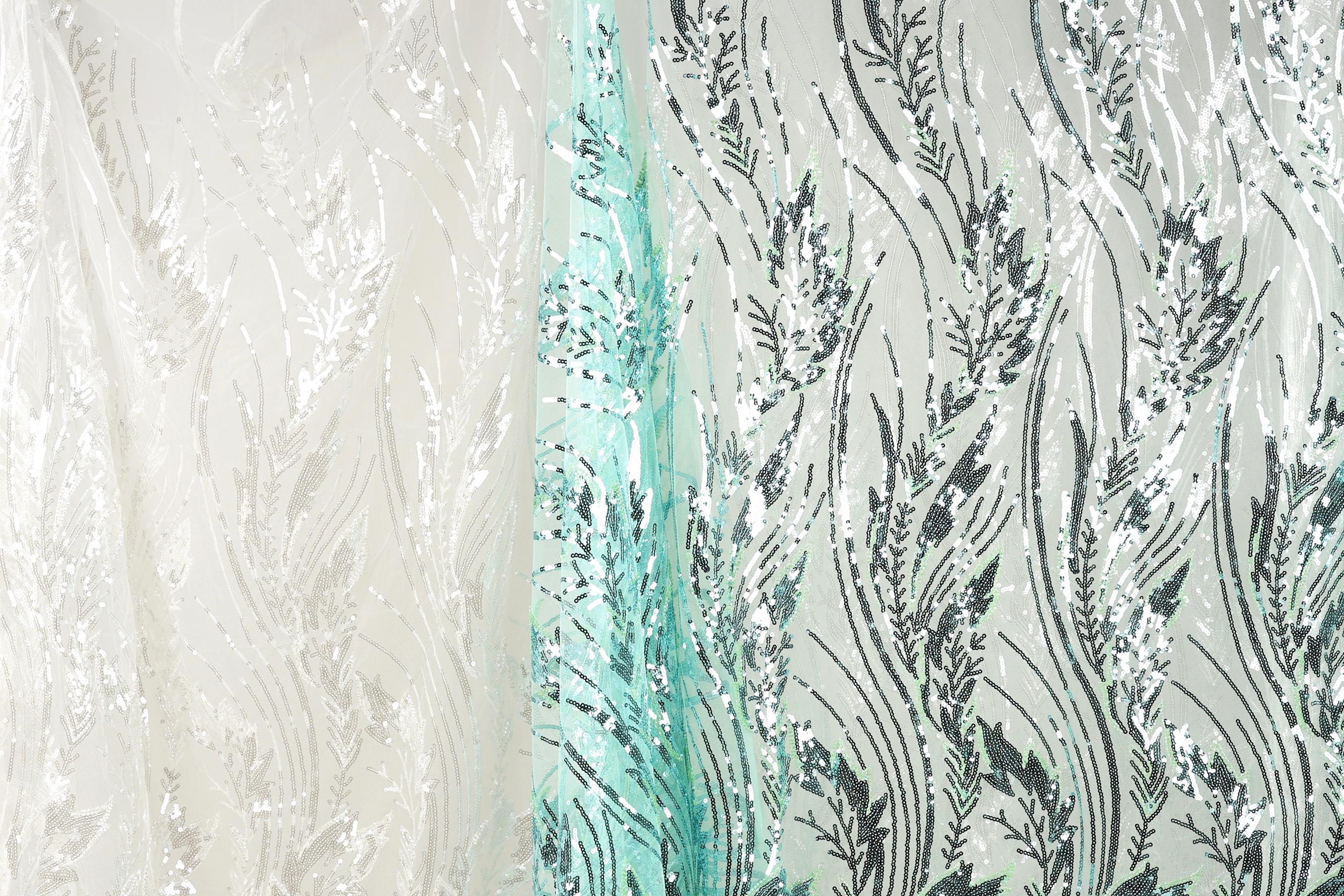 a close-up view of a fabric with a floral pattern, showcasing the intricate details and textures of the design.
