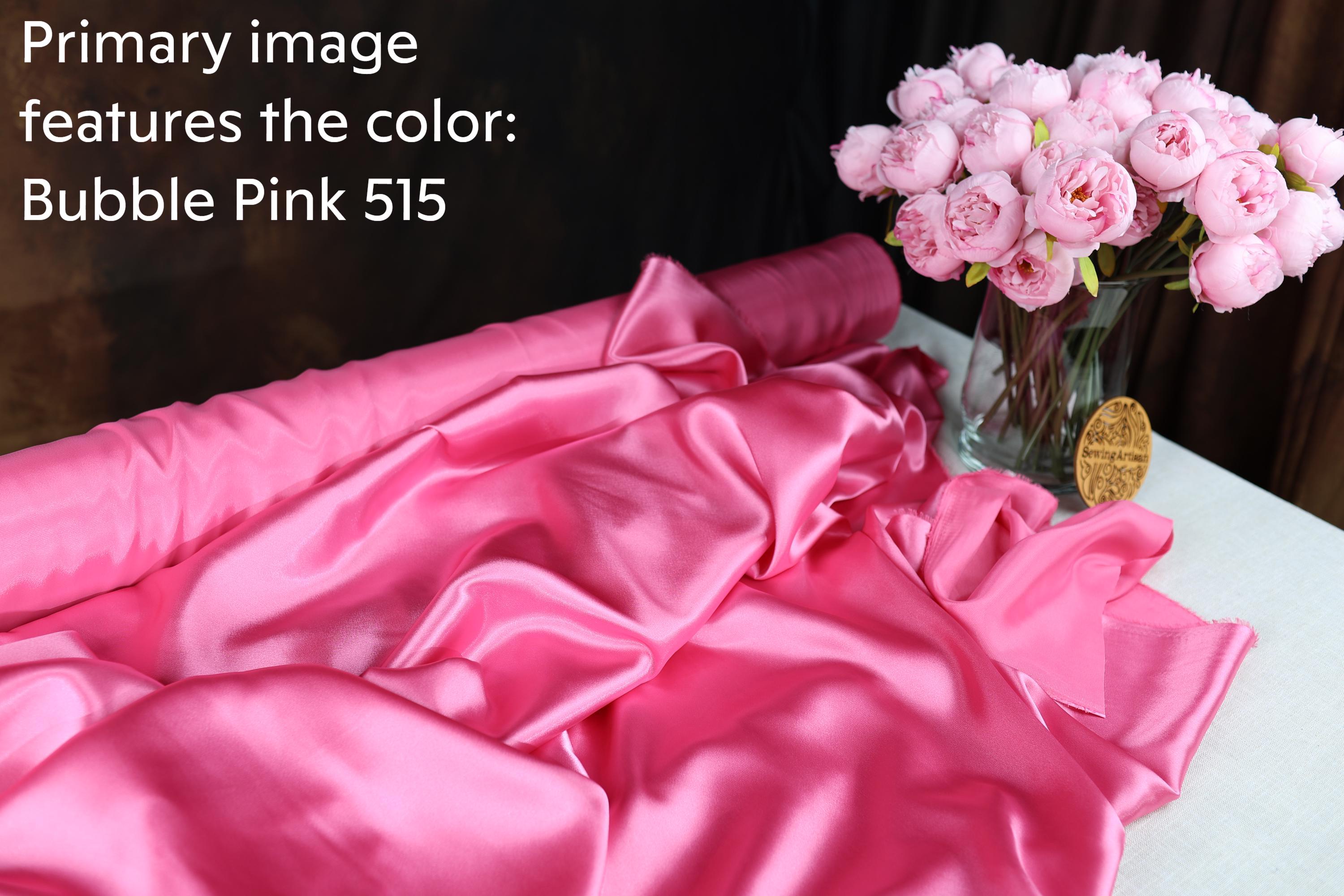 a pink satin fabric and a vase of pink roses, with the text &quot;Primary image features the color: Bubble Pink 515&quot; overlaid on the image.