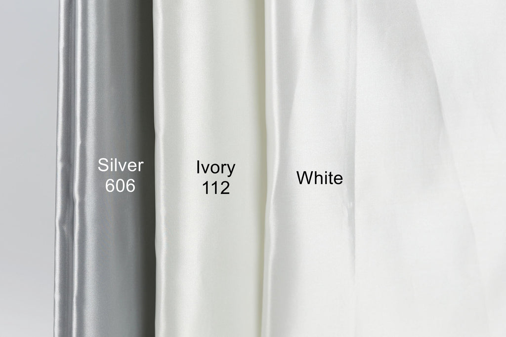 three fabric swatches, each with a different color: silver (606), ivory (112), and white (White).