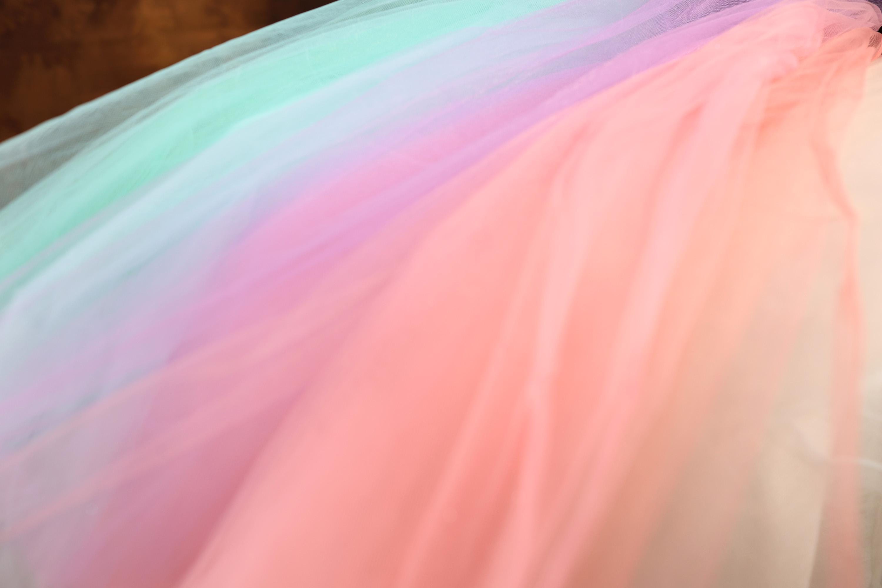 a woman in a dress with a colorful skirt
