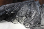 a close up of a piece of cloth on a table