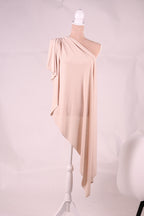 A pink fabric is draped over a white pole, creating a visually striking contrast.