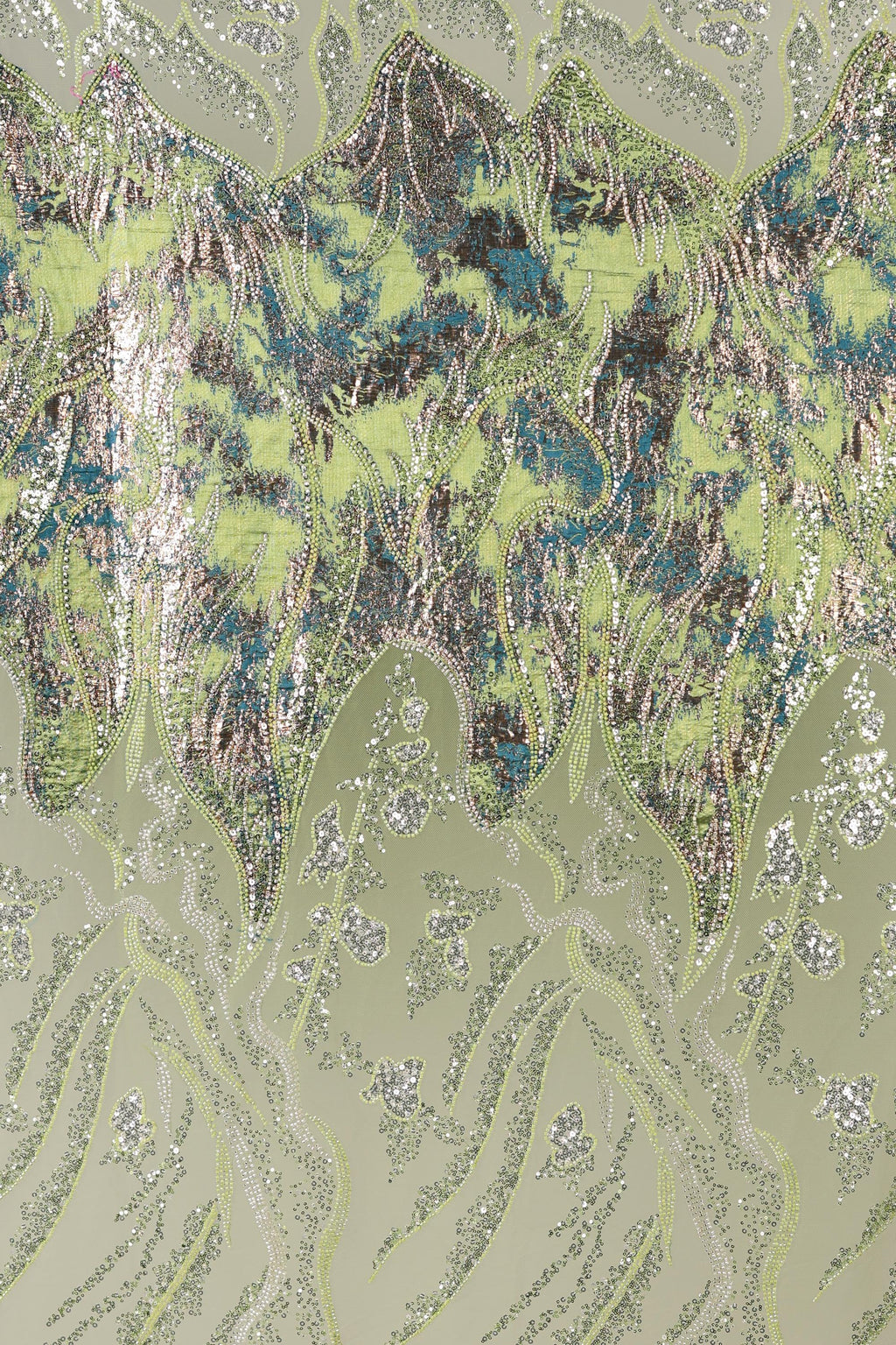 The image is a collage of various images, featuring a pattern of green and brown hues with intricate designs and textures. The overall composition is visually striking and captivating.
