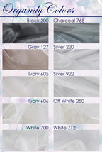 a bunch of different colors of fabric on a white background