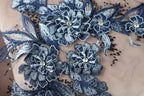 a close up of a piece of cloth with flowers on it