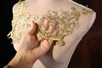 a close up of a person holding a piece of clothing