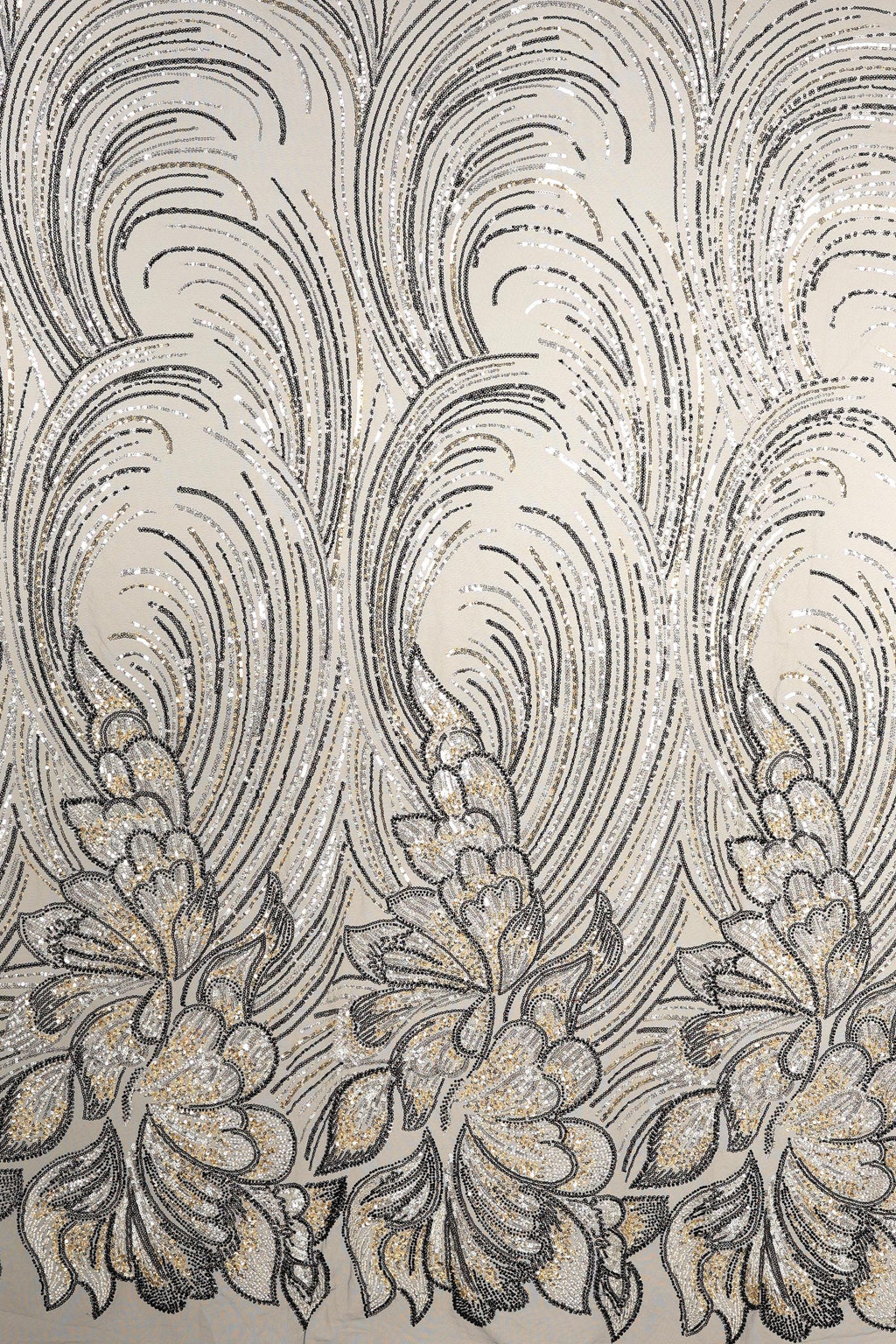 a repeating pattern of black and white floral designs on a light-colored background.