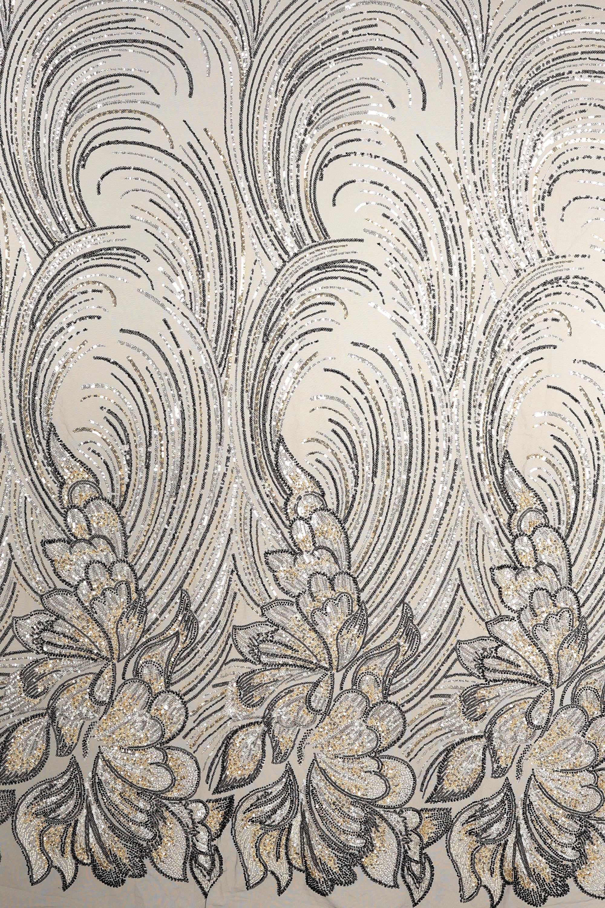 a repeating pattern of black and white floral designs on a light-colored background.