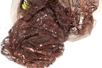 a close-up view of a piece of brown fabric with a sequined pattern, featuring a mix of brown and gold colors.