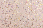 a pattern of pink and white flowers and leaves, with some embellished with sequins, creating a visually appealing and intricate design.