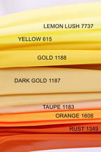 a collection of fabric swatches in various colors, including yellow, orange, and dark gold.